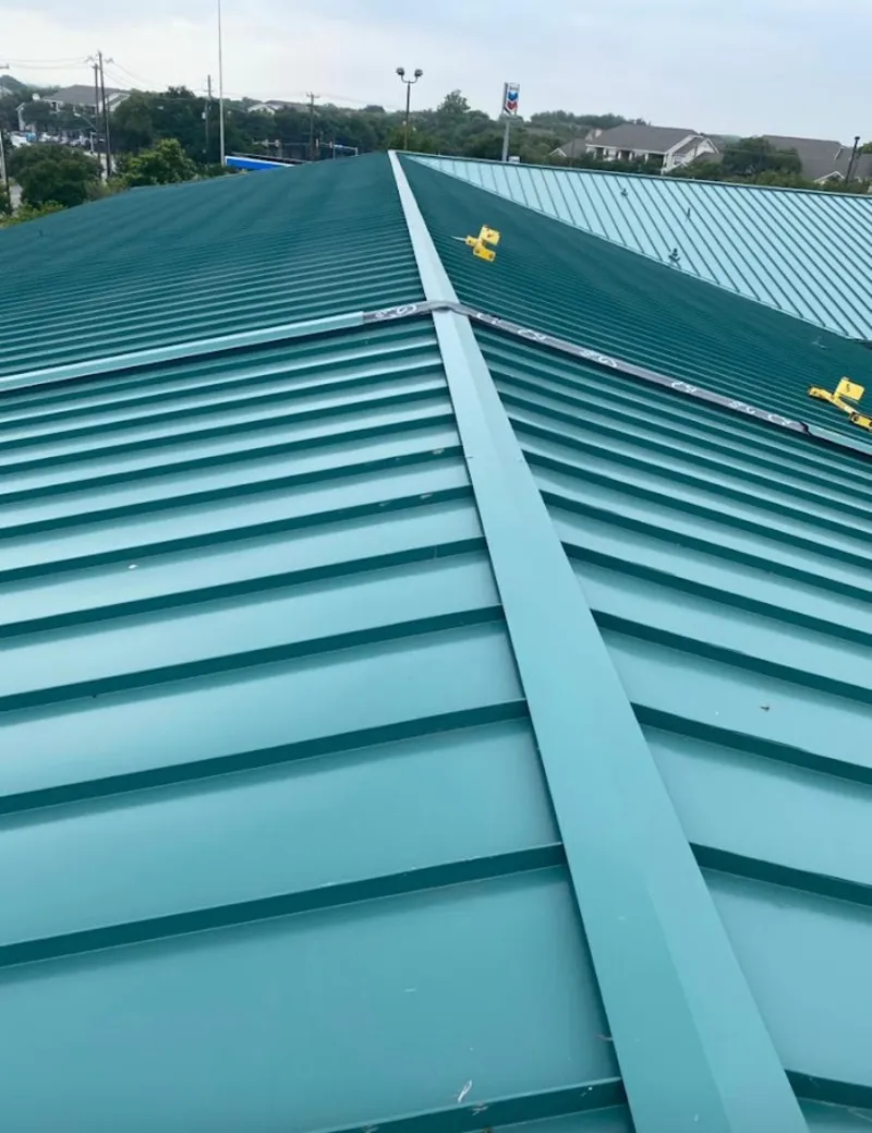 Green commercial metal roof ridge and valley for Metal Roof Repair in Lakeville